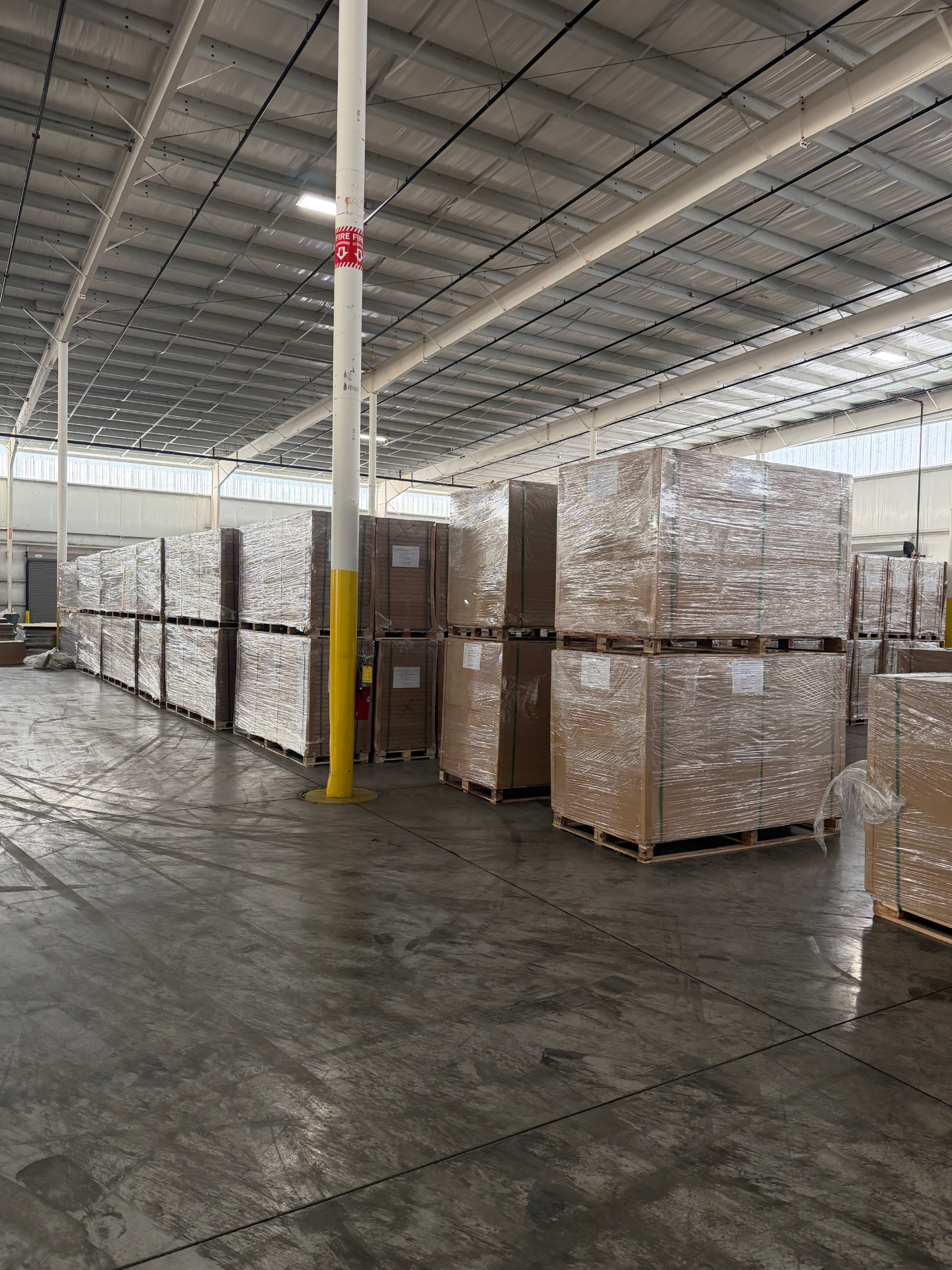 Large wholesale inventory area with palletized product